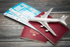 passports-boarding-passes-and-a-miniature-airplane-air-passenger-righog